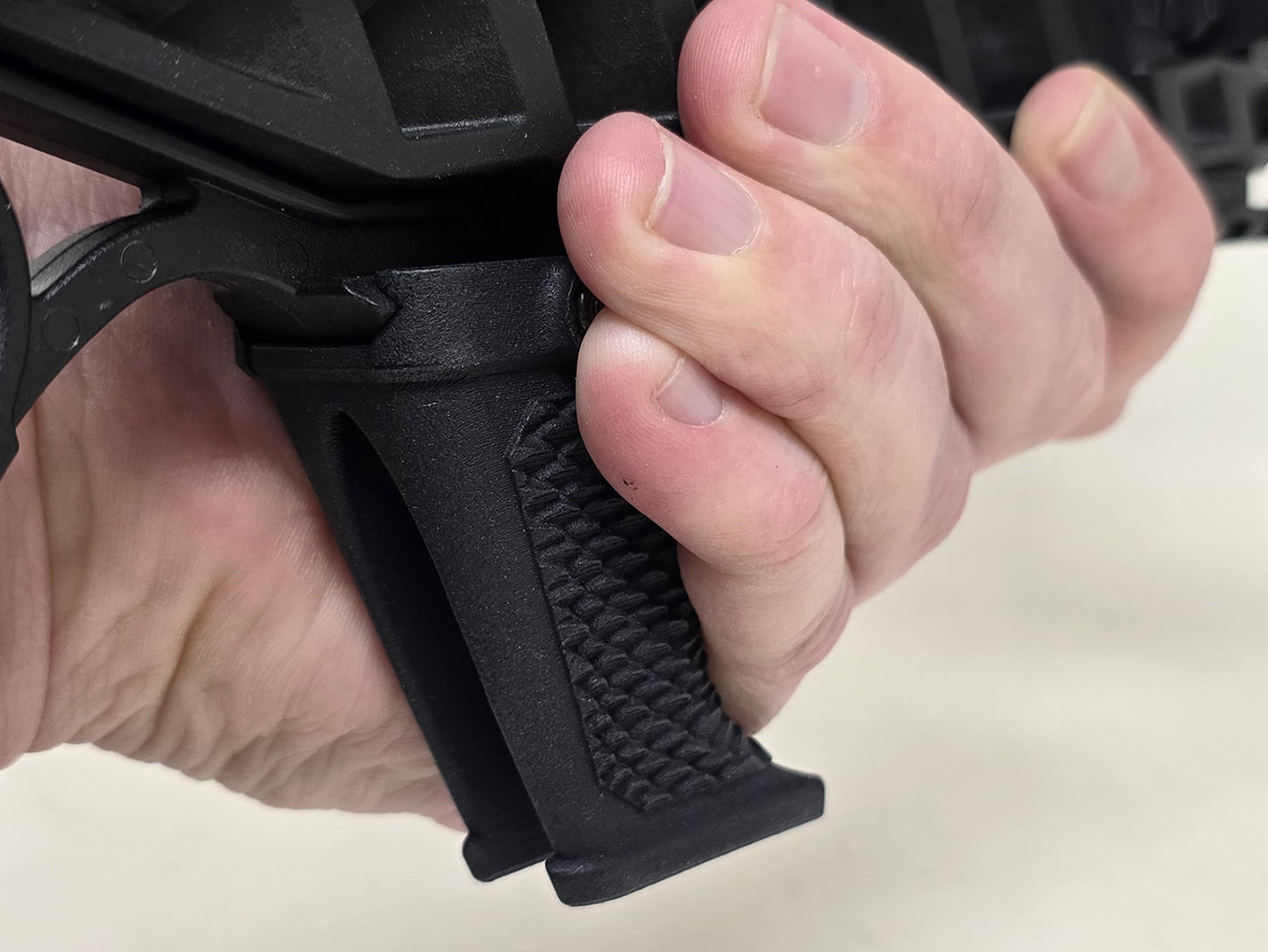 Hand stop installed on a modern sporting rifle