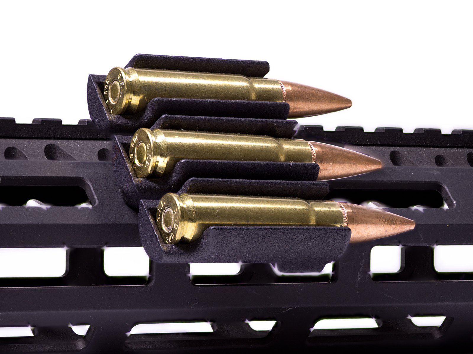 Ammo Carrier for M-LOK rail holding three .223 rounds on a rifle