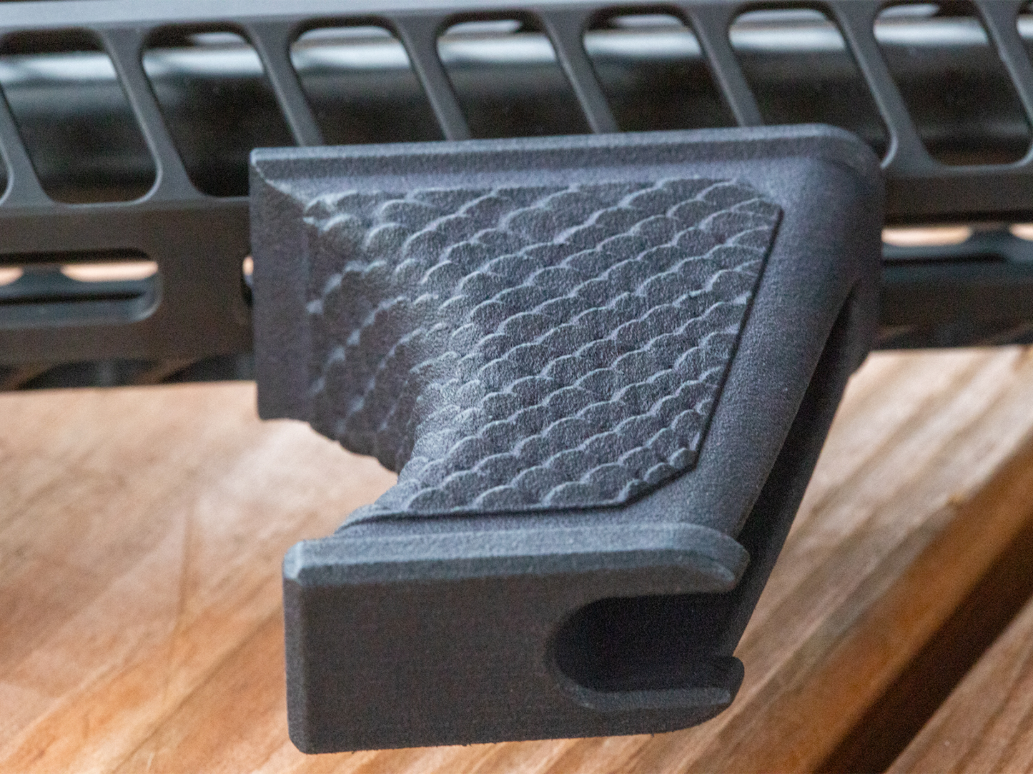 Hand stop installed on a modern sporting rifle